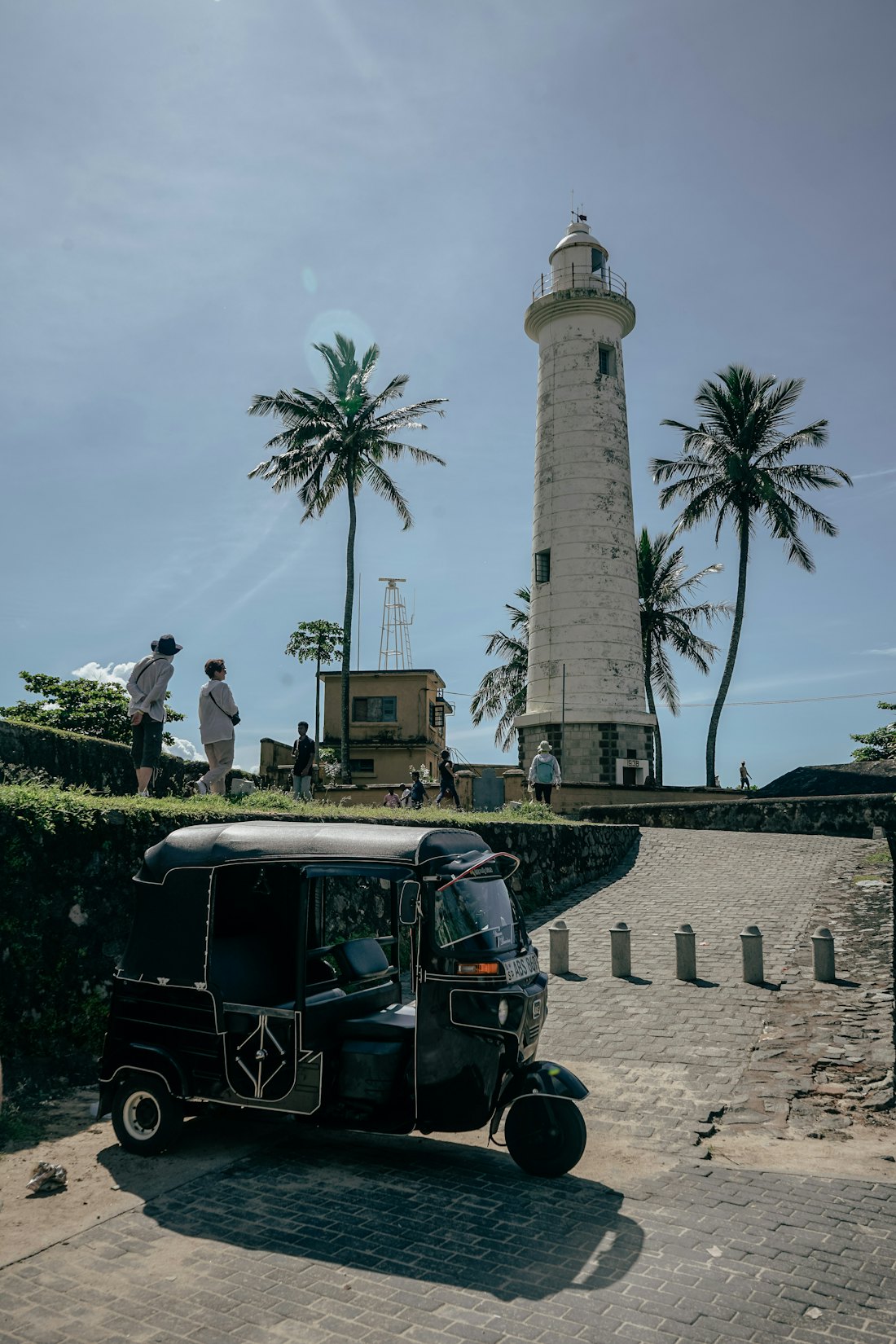 The lighthouse and ramparts of Galle Fort at golden hour