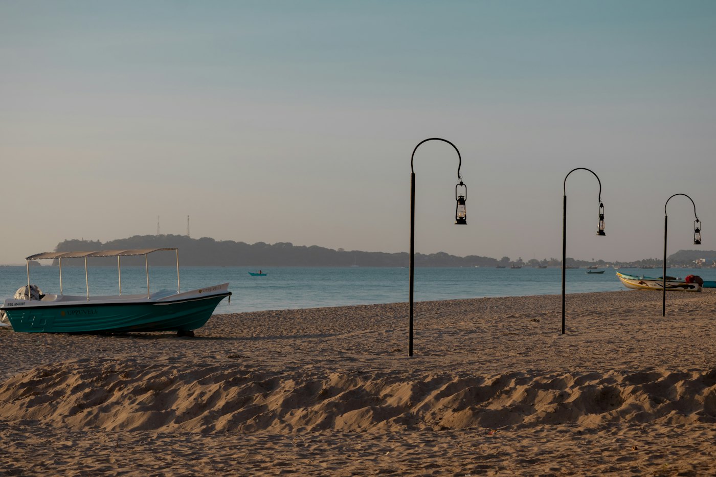Calm turquoise water and empty sand on Sri Lanka's east coast